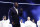 Magic Johnson speaks during a tribute to former NBA All-Star Kobe Bryant and his daughter Gianna who were killed in a helicopter crash on Jan. 26, 2020, before the NBA All-Star basketball game Sunday, Feb. 16, 2020, in Chicago. (AP Photo/Nam Huh)