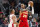 Houston Rockets guard Eric Gordon, left, defends against Atlanta Hawks forward John Collins (20) during the second half of an NBA basketball game Monday, Dec. 13, 2021, in Atlanta. (AP Photo/Hakim Wright Sr.)