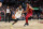 CLEVELAND, OH - JANUARY 17: Kyrie Irving #11 of the Brooklyn Nets drives to the basket during the game against the Cleveland Cavaliers on January 17, 2022 at Rocket Mortgage FieldHouse in Cleveland, Ohio. NOTE TO USER: User expressly acknowledges and agrees that, by downloading and/or using this Photograph, user is consenting to the terms and conditions of the Getty Images License Agreement. Mandatory Copyright Notice: Copyright 2022 NBAE (Photo by Jeff Haynes/NBAE via Getty Images)