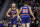 Golden State Warriors guard Klay Thompson (11) is congratulated by guard Stephen Curry (30) after Thompson scored against the Detroit Pistons during the first half of an NBA basketball game in San Francisco, Tuesday, Jan. 18, 2022. (AP Photo/Jed Jacobsohn)