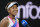 Naomi Osaka of Japan is interviewed after defeating Madison Brengle of the U.S. in their second round match at the Australian Open tennis championships in Melbourne, Australia, Wednesday, Jan. 19, 2022. (AP Photo/Andy Brownbill)