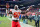 DENVER, COLORADO - JANUARY 08: Willie Gay Jr. #50 of the Kansas City Chiefs exits the field after defeating the Denver Broncos 28-24 at Empower Field At Mile High on January 08, 2022 in Denver, Colorado. (Photo by Dustin Bradford/Getty Images)