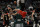 Milwaukee Bucks' Grayson Allen fouls Chicago Bulls' Alex Caruso during the second half of an NBA basketball game Friday, Jan. 21, 2022, in Milwaukee. The Bucks won 94-90. (AP Photo/Morry Gash)