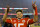 Kansas City Chiefs quarterback Patrick Mahomes celebrates after beating the Buffalo Bills overtime during an NFL divisional playoff football game, Sunday, Jan. 23, 2022 in Kansas City, Mo. (AP Photo/Reed Hoffmann)