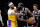 Los Angeles Lakers' Anthony Davis, left, defends Brooklyn Nets' James Harden during the first half of an NBA basketball game Tuesday, Jan. 25, 2022 in New York. (AP Photo/Frank Franklin II)