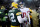 GREEN BAY, WI - JANUARY 8:  Aaron Rodgers #12 of the Green Bay Packers and Eli Manning #10 of the New York Giants meet after the Green Bay Packers beat the New York Giants 38-31 in the NFC Wild Card game at Lambeau Field on January 8, 2017 in Green Bay, Wisconsin. (Photo by Stacy Revere/Getty Images)