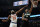 Milwaukee Bucks' Giannis Antetokounmpo dunks past New York Knicks' Mitchell Robinson during the first half of an NBA basketball game Friday, Jan. 28, 2022, in Milwaukee. (AP Photo/Morry Gash)