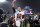 Foxborough, MA - October 3: Tom Brady waves to cheering fans as he leaves the field following the Bucs victory. The New England Patriots host the Tampa Bay Buccaneers in a regular season NFL game at Gillette Stadium in Foxborough, MA on Sunday, Oct. 3, 2021. (Photo by Jim Davis/The Boston Globe via Getty Images)