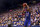 LAWRENCE, KS - JANUARY 29: Keion Brooks Jr. #12 of the Kentucky Wildcats lines up a shot against the Kansas Jayhawks in the second half at Allen Fieldhouse on January 29, 2022 in Lawrence, Kansas. (Photo by Kyle Rivas/Getty Images)