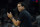 Miami Heat head coach Erik Spoelstra talks to his players during the first half of an NBA basketball game against the San Antonio Spurs, Thursday, Feb. 3, 2022, in San Antonio. (AP Photo/Eric Gay)
