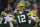 Green Bay Packers' Aaron Rodgers throws during the first half of an NFC divisional playoff NFL football game against the San Francisco 49ers Saturday, Jan. 22, 2022, in Green Bay, Wis. (AP Photo/Aaron Gash)