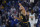 Golden State Warriors guard Stephen Curry celebrates after making a 3-point basket against the Denver Nuggets during the first half of an NBA basketball game in San Francisco, Wednesday, Feb. 16, 2022. (AP Photo/Jeff Chiu)