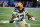 DETROIT, MI - JANUARY 09:  Green Bay Packers wide receiver Davante Adams (17) runs with the ball after catching a pass during a regular season NFL game between the Green Bay Packers and the Detroit Lions on January 9, 2022 at Ford Field in Detroit, Michigan.  (Photo by Scott W. Grau/Icon Sportswire via Getty Images)
