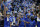 Duke players celebrate after defeating Arkansas in a college basketball game in the Elite 8 round of the NCAA men's tournament in San Francisco, Saturday, March 26, 2022. (AP Photo/Tony Avelar)