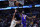 Los Angeles Lakers forward LeBron James (6) goes to the basket against New Orleans Pelicans guard CJ McCollum (3) in the first half of an NBA basketball game in New Orleans, Sunday, March 27, 2022. (AP Photo/Gerald Herbert)