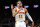 ATLANTA, GA - MARCH 31: Trae Young #11 of the Atlanta Hawks reacts during the second half against the Cleveland Cavaliers at State Farm Arena on March 31, 2022 in Atlanta, Georgia. NOTE TO USER: User expressly acknowledges and agrees that, by downloading and or using this photograph, User is consenting to the terms and conditions of the Getty Images License Agreement. (Photo by Todd Kirkland/Getty Images)
