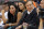 FILE - In this Oct. 25, 2013, file photo, then-Los Angeles Clippers owner Donald Sterling, right, and V. Stiviano, left, watch the Clippers play the Sacramento Kings during an NBA basketball game in Los Angeles. Former Billionaire Donald Sterling has dropped his lawsuit against a former female friend over the recording of his off-color remarks that cost him ownership of the Los Angeles Clippers. A Los Angeles County judge dismissed the lawsuit against V. Stiviano on Wednesday at Sterling's request. (AP Photo/Mark J. Terrill, File)