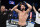 ABU DHABI, UNITED ARAB EMIRATES - OCTOBER 30: Khamzat Chimaev of Sweden reacts after his victory over Li Jingliang of China in a welterweight fight during the UFC 267 event at Etihad Arena on October 30, 2021 in Yas Island, Abu Dhabi, United Arab Emirates. (Photo by Chris Unger/Zuffa LLC)