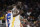 Golden State Warriors forward Draymond Green (23) reacts during the second half of an NBA basketball game against the Washington Wizards, Sunday, March 27, 2022, in Washington. The Wizards won 123-115. (AP Photo/Nick Wass)