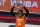 Team WNBA's Arike Ogunbowale holds up the MVP trophy after Team WNBA defeated United States in a WNBA All-Star basketball game, Wednesday, July 14, 2021, in Las Vegas. (AP Photo/John Locher)