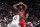PHILADELPHIA, PA - APRIL 9: Joel Embiid #21 of the Philadelphia 76ers looks to pass the ball during the game against the Indiana Pacers on April 9, 2022 at the Wells Fargo Center in Philadelphia, Pennsylvania NOTE TO USER: User expressly acknowledges and agrees that, by downloading and/or using this Photograph, user is consenting to the terms and conditions of the Getty Images License Agreement. Mandatory Copyright Notice: Copyright 2022 NBAE (Photo by David Dow/NBAE via Getty Images)