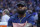 Los Angeles Lakers' LeBron James sits on the bench during the first half of the team's NBA basketball game against the Golden State Warriors in San Francisco, Thursday, April 7, 2022. (AP Photo/Jeff Chiu)