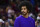 Cleveland Cavaliers center Jarrett Allen stands near the bench after the Cavaliers defeated the Milwaukee Bucks 133-115 in an NBA basketball game, Sunday, April 10, 2022, in Cleveland. (AP Photo/David Dermer)