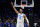 UCLA's Johnny Juzang reacts during the first half of a college basketball game against North Carolina in the Sweet 16 round of the NCAA tournament, Friday, March 25, 2022, in Philadelphia. (AP Photo/Matt Rourke)