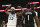 Minnesota Timberwolves guard Patrick Beverley (22) flexes in front of Los Angeles Clippers guard Reggie Jackson (1) during an NBA basketball game Tuesday, April 12, 2022, in Minneapolis. (AP Photo/Andy Clayton-King)