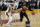 Atlanta Hawks guard Trae Young (11) drives to the basket as Miami Heat guard Gabe Vincent defends during the first half of Game 1 of an NBA basketball first-round playoff series, Sunday, April 17, 2022, in Miami. (AP Photo/Lynne Sladky)