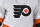 MONTREAL, QC - DECEMBER 16:  A detailed view of the Philadelphia Flyers' logo seen on a jersey during overtime against the Montreal Canadiens at Centre Bell on December 16, 2021 in Montreal, Canada.  The Montreal Canadiens defeated the Philadelphia Flyers 3-2 in a shootout.  (Photo by Minas Panagiotakis/Getty Images)
