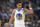 Golden State Warriors guard Jordan Poole gestures to the bench during the second half of Game 3 of the team's NBA basketball first-round playoff series against the Denver Nuggets on Thursday, April 21, 2022, in Denver. (AP Photo/David Zalubowski)
