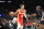 ATLANTA, GA - APRIL 22: Trae Young #11 of the Atlanta Hawks dribbles the ball during Round 1 Game 3 of the 2022 NBA Playoffs against the Miami Heat on April 22, 2022 at State Farm Arena in Atlanta, Georgia.  NOTE TO USER: User expressly acknowledges and agrees that, by downloading and/or using this Photograph, user is consenting to the terms and conditions of the Getty Images License Agreement. Mandatory Copyright Notice: Copyright 2022 NBAE (Photo by Adam Hagy/NBAE via Getty Images)