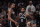 NEW YORK, NEW YORK - APRIL 23: Kevin Durant #7 and Kyrie Irving #11 of the Brooklyn Nets look on in the final seconds of their 109-103 loss against the Boston Celtics during Game Three of the Eastern Conference First Round NBA Playoffs at Barclays Center on April 23, 2022 in New York City. NOTE TO USER: User expressly acknowledges and agrees that, by downloading and or using this photograph, User is consenting to the terms and conditions of the Getty Images License Agreement. (Photo by Al Bello/Getty Images).