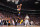 PHOENIX, AZ - APRIL 26: Mikal Bridges #25 of the Phoenix Suns dunks the ball against the New Orleans Pelicans during Round 1 Game 5 of the 2022 NBA Playoffs on April 26, 2022 at Footprint Center in Phoenix, Arizona. NOTE TO USER: User expressly acknowledges and agrees that, by downloading and or using this photograph, user is consenting to the terms and conditions of the Getty Images License Agreement. Mandatory Copyright Notice: Copyright 2022 NBAE (Photo by Barry Gossage/NBAE via Getty Images)