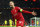 LIVERPOOL, ENGLAND - APRIL 27: Jordan Henderson of Liverpool celebrates after their team's first goal which came through a Geronimo Rulli of Villarreal CF (not pictured) own goal during the UEFA Champions League Semi Final Leg One match between Liverpool and Villarreal at Anfield on April 27, 2022 in Liverpool, England. (Photo by David Ramos/Getty Images)