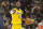 Los Angeles Lakers forward LeBron James dribbles during an NBA basketball game against the Minnesota Timberwolves Wednesday, March 16, 2022, in Minneapolis. (AP Photo/Andy Clayton-King)