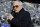 FILE - Dallas Cowboys owner Jerry Jones walks on the field before an NFL football game between the New York Giants and the Cowboys on Dec. 19, 2021, in East Rutherford, N.J. Alexandra Davis, 25, who grew up in North Texas, is suing Jones, claiming he is her biological father. Alexandra Davis says in a lawsuit filed last week in Dallas County that she was conceived from a relationship Jones had with her mother, Cynthia Davis, in the mid-1990s, The Dallas Morning News reported Wednesday, March 9, 2022. (AP Photo/Corey Sipkin, File)