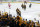 BOSTON, MA - MAY 06: Charlie Coyle #13 of the Boston Bruins skates back to the bench to celebrate his first period goal against the Carolina Hurricanes in Game Three of the First Round of the 2022 Stanley Cup Playoffs at the TD Garden on May 6, 2022 in Boston, Massachusetts. (Photo by Steve Babineau/NHLI via Getty Images)