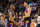 PHOENIX, AZ - MAY 2:  Chris Paul #3 and Devin Booker #1 of the Phoenix Suns look on during the game against the Dallas Mavericks during Game 1 of the 2022 NBA Playoffs Western Conference Semifinals on May 2, 2022 at Footprint Center in Phoenix, Arizona. NOTE TO USER: User expressly acknowledges and agrees that, by downloading and or using this photograph, user is consenting to the terms and conditions of the Getty Images License Agreement. Mandatory Copyright Notice: Copyright 2022 NBAE (Photo by Jim Poorten/NBAE via Getty Images)