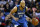 Minnesota Timberwolves forward Adreian Payne (33) drives with the ball during the second half of an NBA basketball game Saturday, Feb. 27, 2016, in New Orleans. The Timberwolves won 112-110. (AP Photo/Jonathan Bachman)