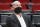 PORTLAND, OREGON - DECEMBER 17: Interim general manager Joe Cronin of the Portland Trail Blazers watches players on the court prior to the game against the Charlotte Hornets at Moda Center on December 17, 2021 in Portland, Oregon. NOTE TO USER: User expressly acknowledges and agrees that, by downloading and or using this photograph, User is consenting to the terms and conditions of the Getty Images License Agreement. (Photo by Soobum Im/Getty Images)