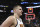 Denver Nuggets center Nikola Jokic walks off the court after the team's loss in Game 5 of an NBA basketball first-round playoff series against the Golden State Warriors in San Francisco, Wednesday, April 27, 2022. The Warriors won the series. (AP Photo/Jed Jacobsohn)