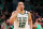 BOSTON, MASSACHUSETTS - MAY 15: Grant Williams #12 of the Boston Celtics reacts after making a three point basket during the third quarter against the Milwaukee Bucks in Game Seven of the 2022 NBA Playoffs Eastern Conference Semifinals at TD Garden on May 15, 2022 in Boston, Massachusetts. NOTE TO USER: User expressly acknowledges and agrees that, by downloading and/or using this photograph, User is consenting to the terms and conditions of the Getty Images License Agreement. (Photo by Adam Glanzman/Getty Images)