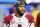 FILE - Arizona Cardinals quarterback Kyler Murray (1) warms up before an NFL wild-card playoff football game against the Los Angeles Rams in Inglewood, Calif., Jan. 17, 2022. The Cardinals appeared to be one of the more stable franchises in the NFL just six months ago. That changed a little after a late-season collapse and a passive-aggressive contract spat between Murray and the team’s front office brought some drama to the desert. (AP Photo/Marcio Jose Sanchez, File)