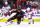 RALEIGH, NORTH CAROLINA - MAY 18: Teuvo Teravainen #86 of the Carolina Hurricanes is checked by Alexis Lafreniere #13 of the New York Rangers during the second period in Game One of the Second Round of the 2022 Stanley Cup Playoffs  at PNC Arena on May 18, 2022 in Raleigh, North Carolina. (Photo by Bruce Bennett/Getty Images)