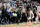 MIAMI, FLORIDA - MAY 25: Jayson Tatum #0 of the Boston Celtics drives to the ball against P.J. Tucker #17 and Jimmy Butler #22 of the Miami Heat during the first quarter in Game Five of the 2022 NBA Playoffs Eastern Conference Finals at FTX Arena on May 25, 2022 in Miami, Florida. NOTE TO USER: User expressly acknowledges and agrees that, by downloading and or using this photograph, User is consenting to the terms and conditions of the Getty Images License Agreement. (Photo by Andy Lyons/Getty Images)
