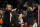 LAS VEGAS, NEVADA - MAY 08: Head coach Becky Hammon of the Las Vegas Aces talks with Jackie Young #0 during their game against the Seattle Storm at Michelob ULTRA Arena on May 08, 2022 in Las Vegas, Nevada. The Aces defeated the Storm 85-74. NOTE TO USER: User expressly acknowledges and agrees that, by downloading and or using this photograph, User is consenting to the terms and conditions of the Getty Images License Agreement. (Photo by Ethan Miller/Getty Images)