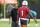 DAVIE, FL - JUNE 01: Miami Dolphins head coach Mike McDaniel talks with Miami Dolphins quarterback Tua Tagovailoa (1) during the first mandatory  minicamp at the Baptist Health Training Complex on June 1, 2022, in Miami Gardens, Florida. (Photo by Doug Murray/Icon Sportswire via Getty Images)