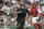 Home plate umpire Bruce Froemming, attempts to keep Boston Red Sox catcher Jason Varitek, right, away New York Yankees batter Alex Rodriguez in the third inning after Rodriguez was hit by a pitch by Red Sox's Bronson Arroyo  at Fenway Park in Boston.  Varitek and Rodriguez were removed from the game after the two fought, an incident that ended in a bench-clearing brawl.  The Red Sox won, 11-10,  with a 9th-inning game winning home run by Bill Mueller (Photo by J Rogash/WireImage)